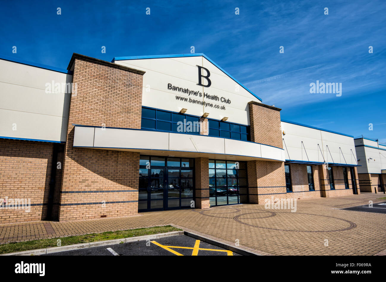 Front of a branch of Bannatynes Health Club against blue sky Stock Photo