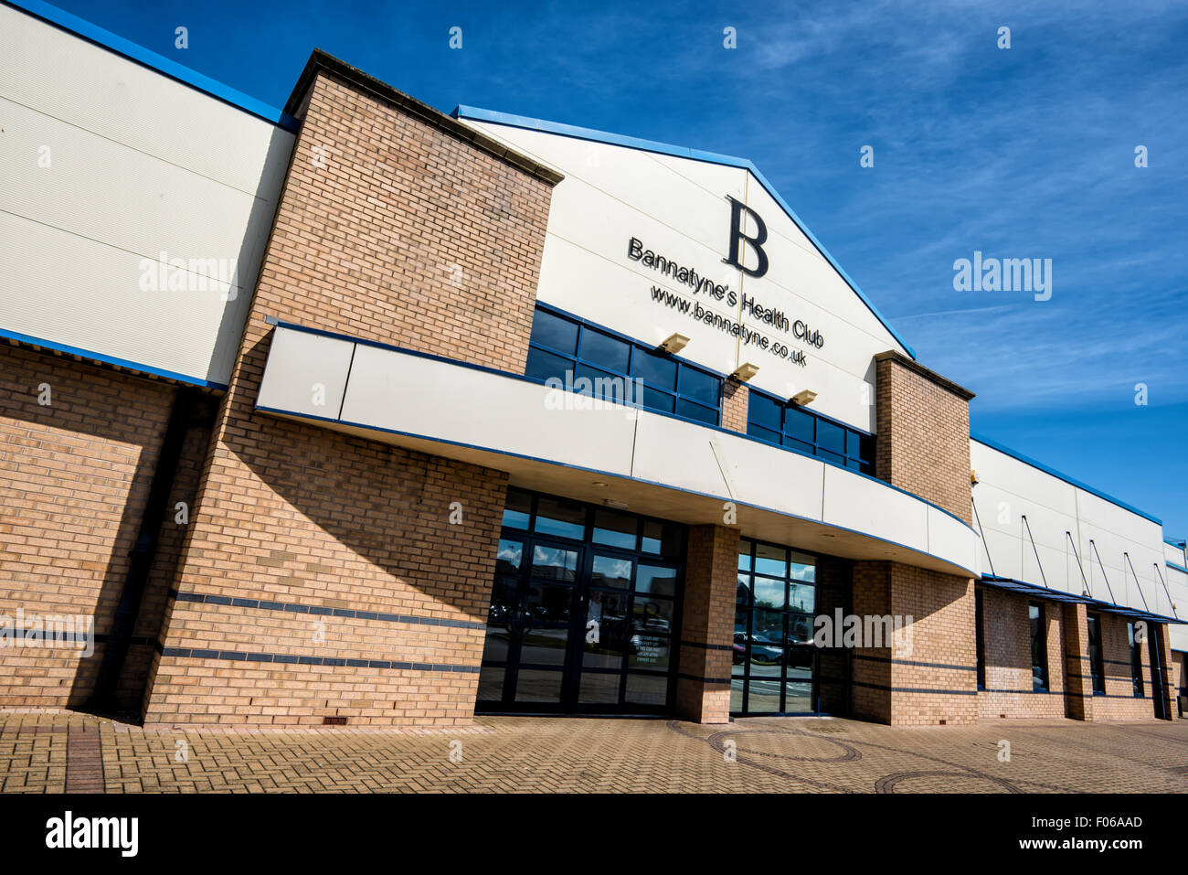 Front of a branch of Bannatynes Health Club against blue sky Stock Photo