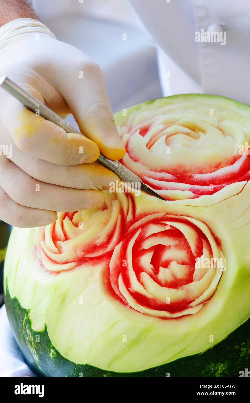 Chef Carving Watermelon Stock Photo