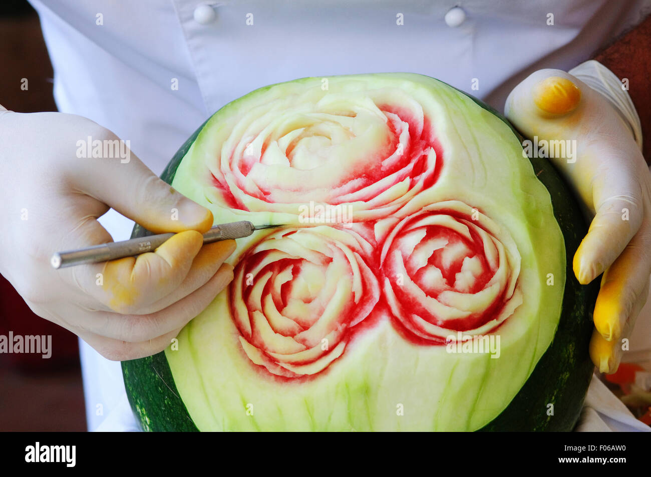 Chef Carving Watermelon Stock Photo