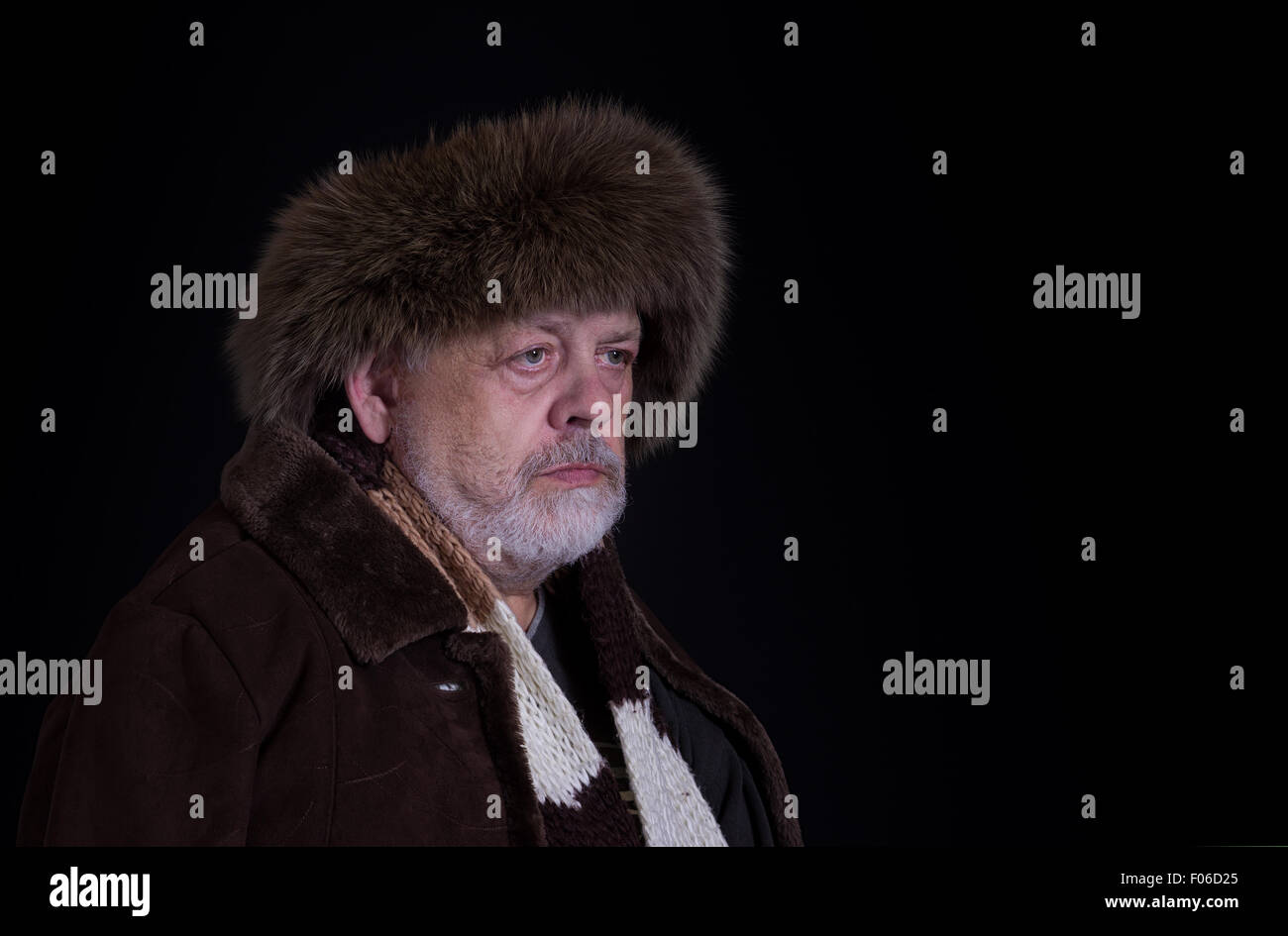 Portrait of tough senior man in winter clothes Stock Photo