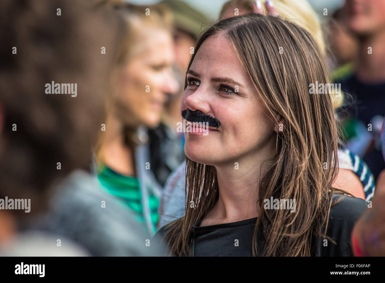 Girl wearing a fake mustache hi-res stock photography and images - Alamy