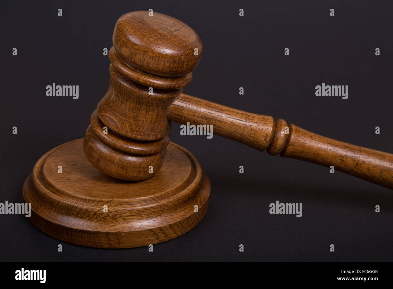 Wooden brown Judges gavel or auction hammer Stock Photo