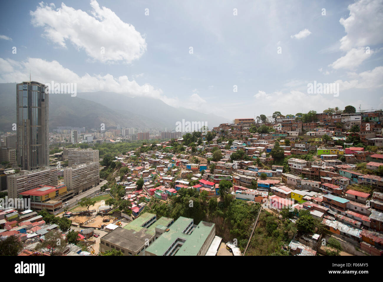Small wooden colored houses in the poor neighborhood in Caracas. It cover the hills around Caracas and it is dangerous. Stock Photo