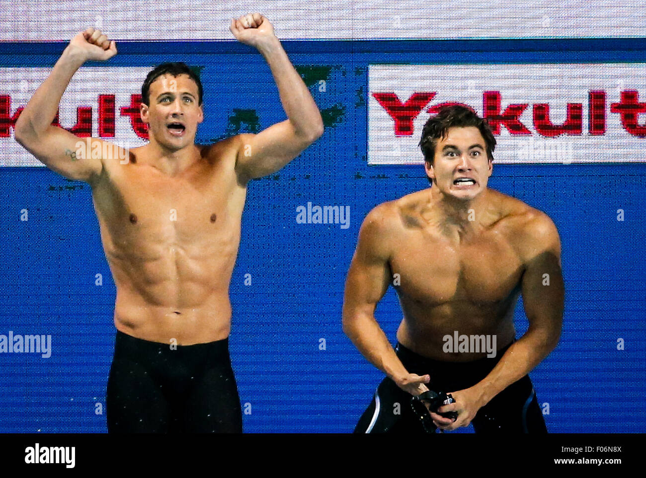 Kazan, Russia. 8th Aug, 2015. Ryan Lochte (L) and Nathan Adrian of the relay team of the United States react during the mixed 4x100m freestyle relay final at FINA World Championships in Kazan, Russia, Aug. 8, 2015. The United States claimed the title and broke the world record in a time of 3 minutes 23.05 seconds. © Zhang Fan/Xinhua/Alamy Live News Stock Photo
