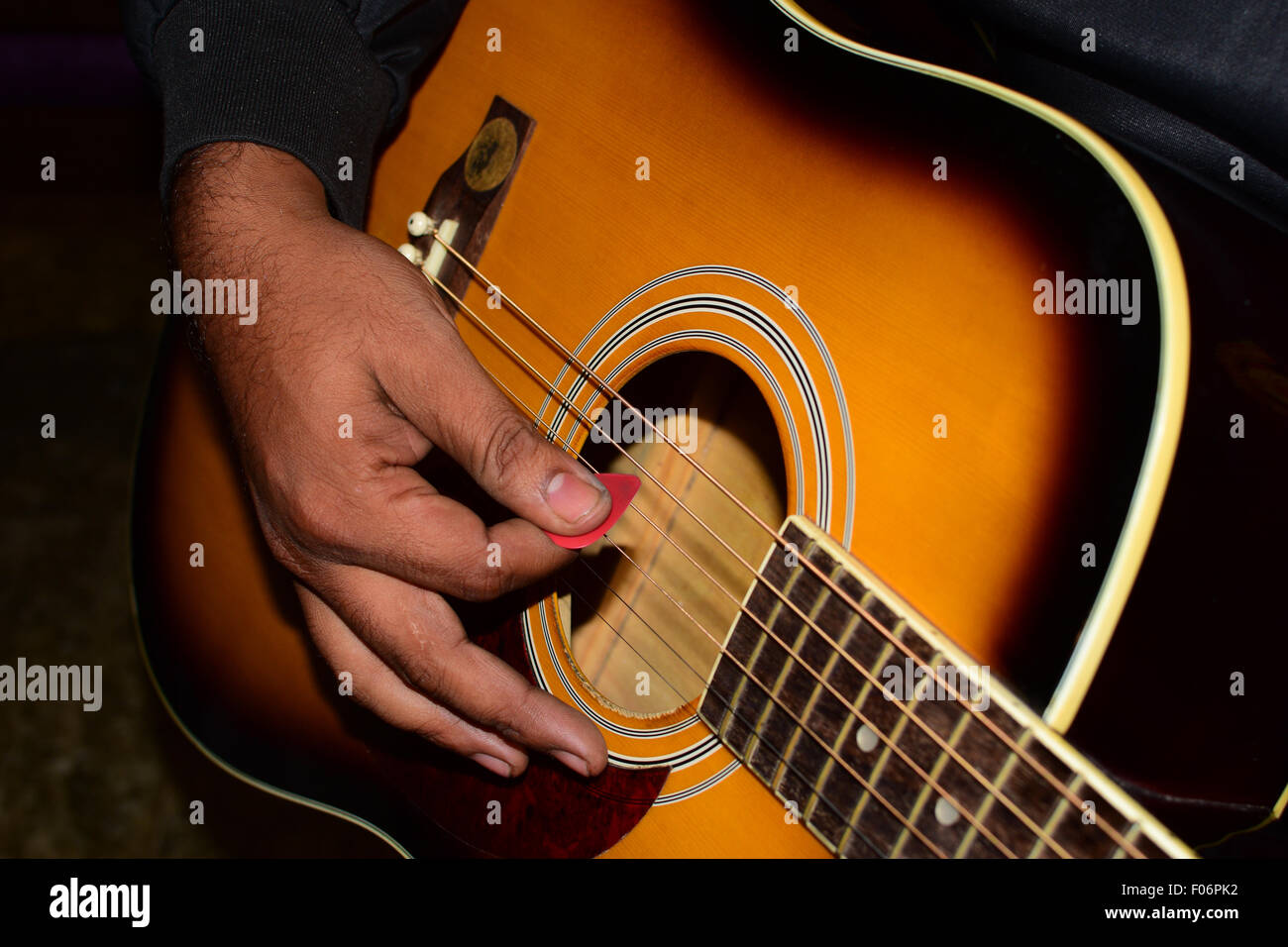 Guitarist playing guitar music guitar player hand closeup Stock Photo