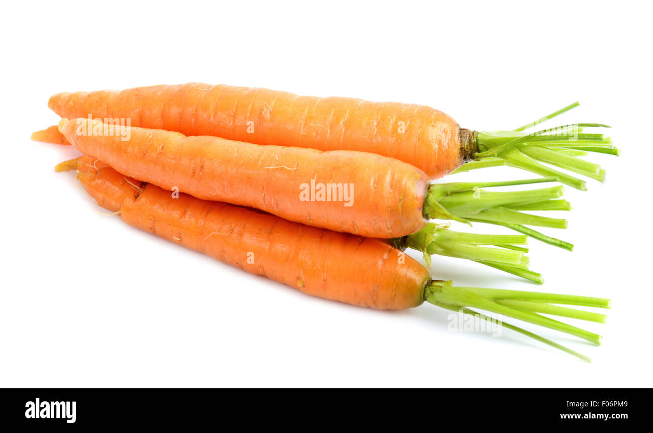 Heap of carrots isolated on white Stock Photo