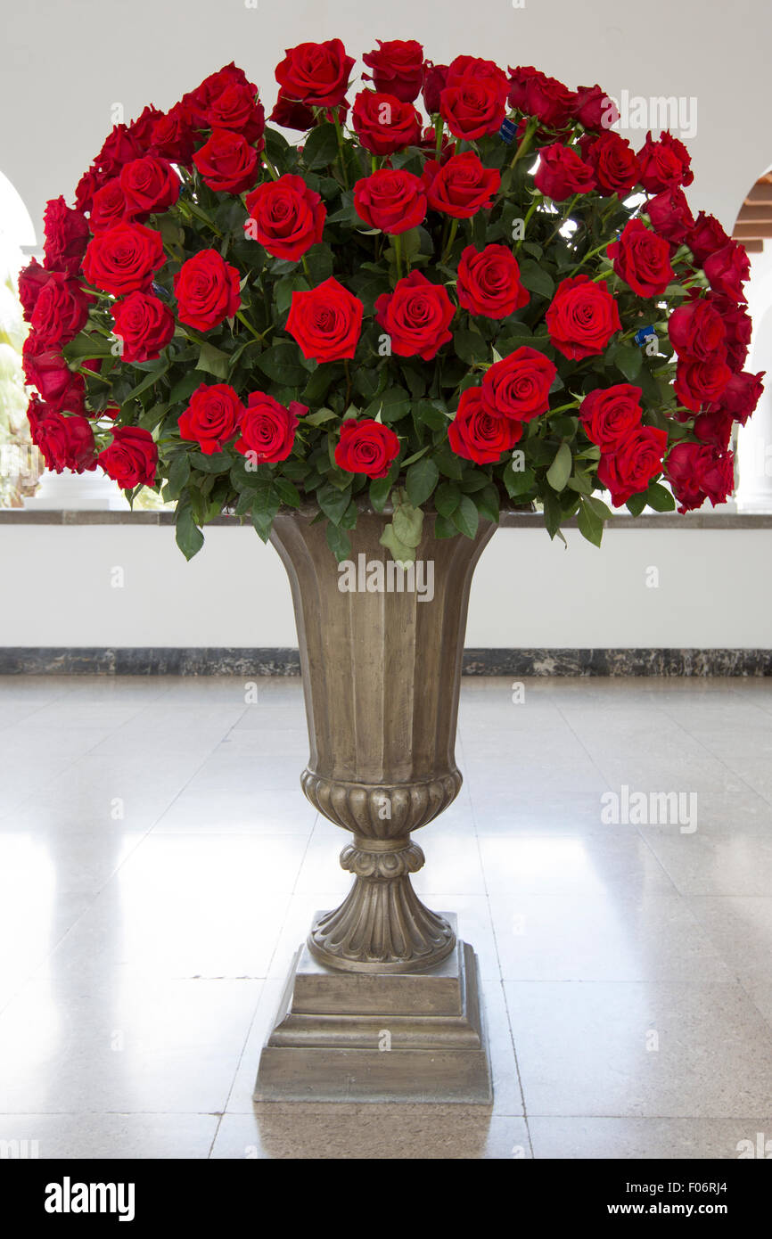 Huge Bunch Of Red Roses In Stone Vase Located In Quito Ecuador