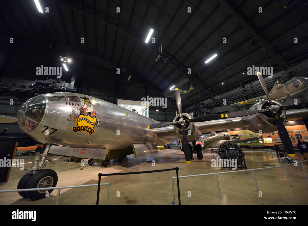 Dayton, Ohio, USA. 6th Aug, 2015. Visitors look at the Bockscar B-29 bomber at the National Museum of the United States Air Force in Dayton, Ohio, Aug. 6, 2015. To accelerate Japan's surrender in World War II, the U.S. army dropped atom bombs 'Little Boy' and 'Fat Man' respectively to the Japanese cities of Hiroshima and Nagasaki in August 1945. © Yin Bogu/Xinhua/Alamy Live News Stock Photo