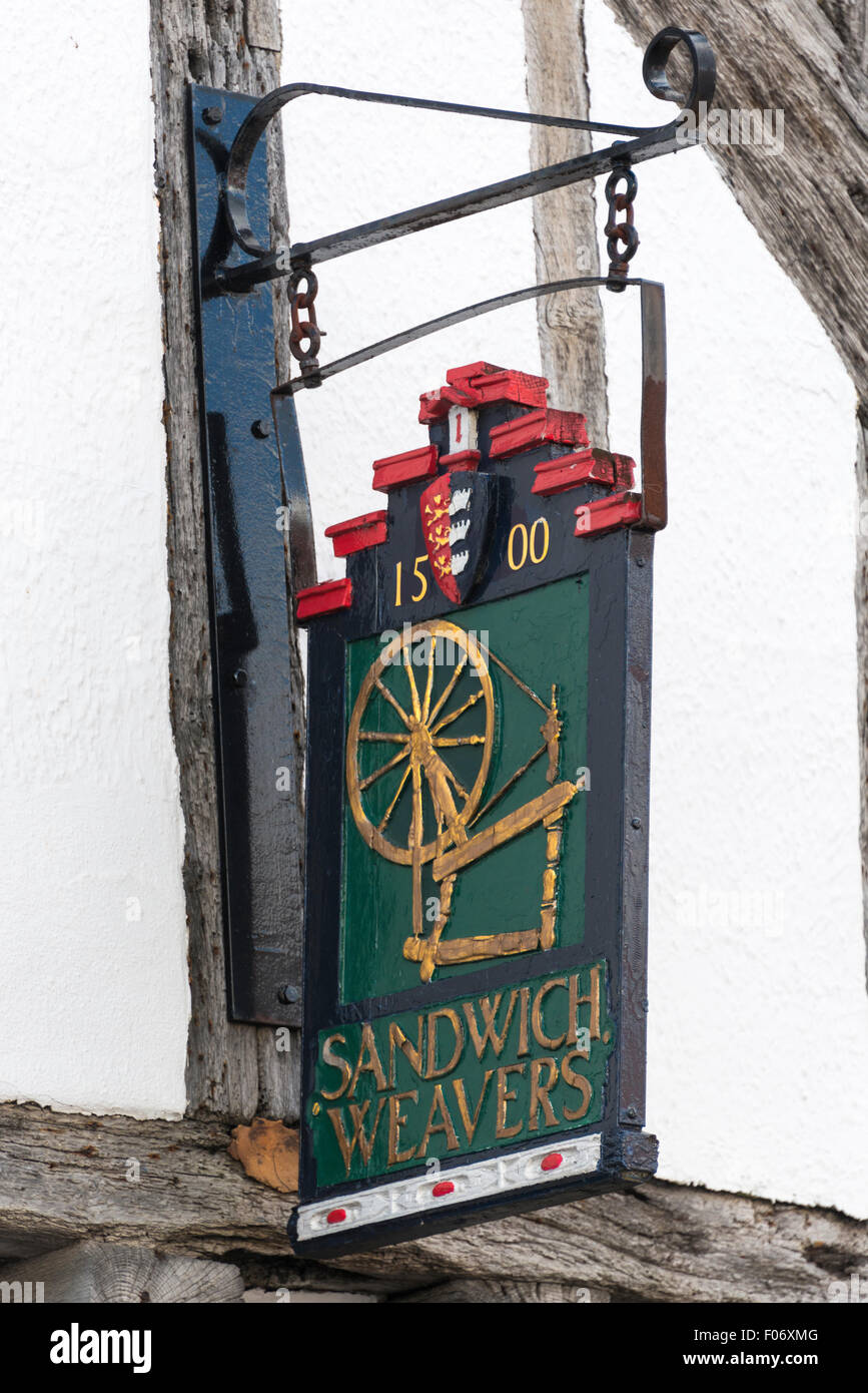 Sign of the Sandwich Weavers Guild on a historic medieval timber framed building. Stock Photo