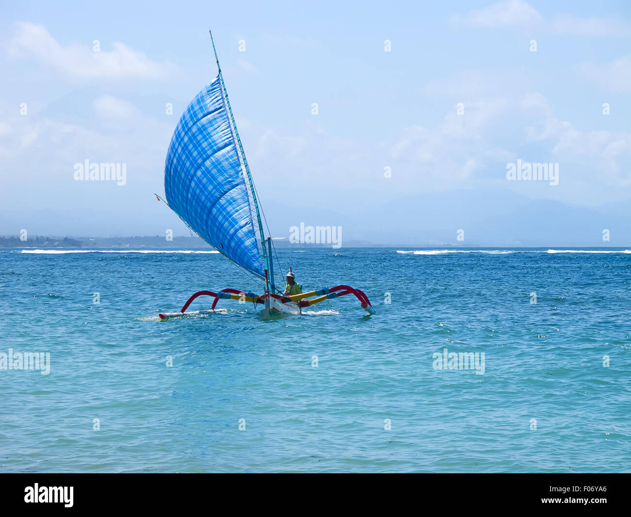 Traditional balinese "dragonfly" boat on the beach Stock Photo