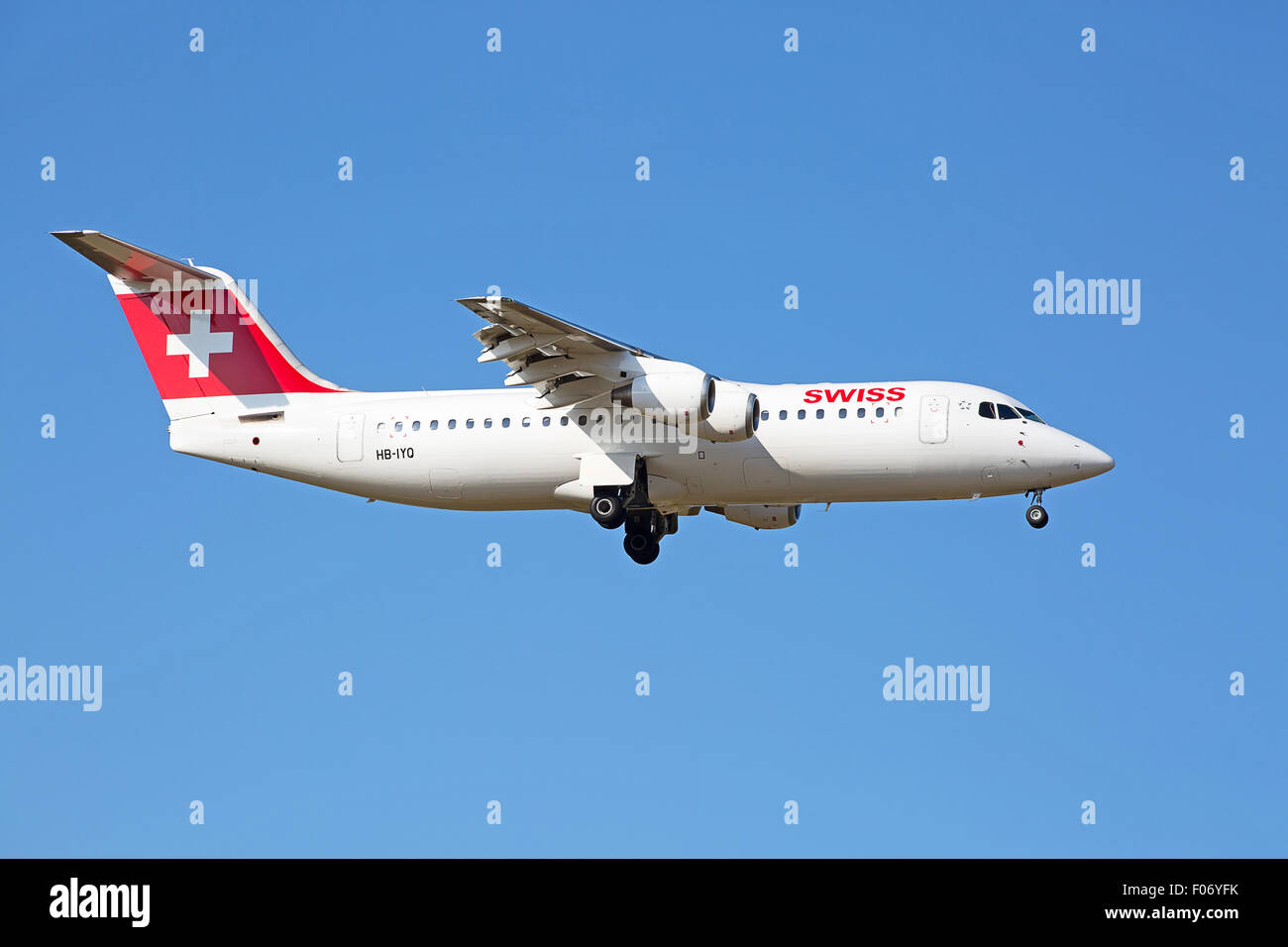 ZURICH - JULY 18: AVRO RJ100 landing in Zurich airport after short haul flight on July 18, 2015 in Zurich, Switzerland. Zurich a Stock Photo