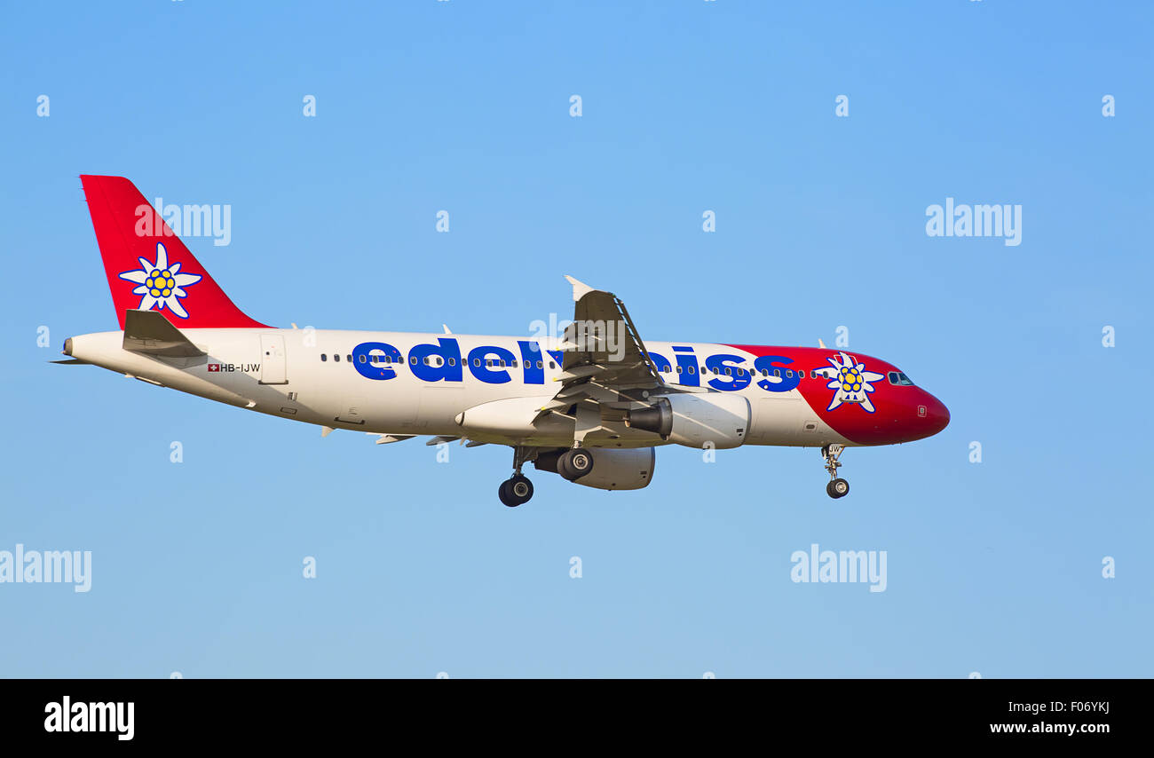 ZURICH - JULY 18: Airbus A319, Edelweiss Air landing in Zurich airport after short haul flight on July 18, 2015 in Zurich, Switz Stock Photo