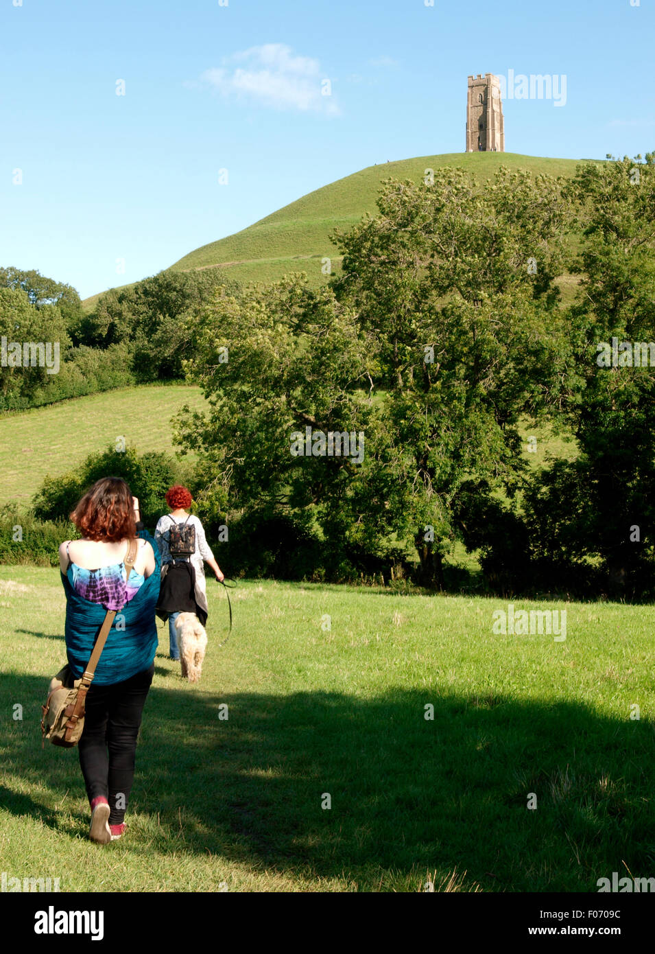 People heading towards Glastonbury Tor, Somerset, UK Stock Photo