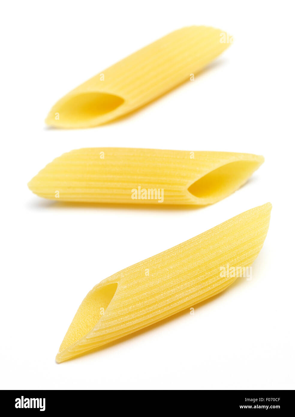 Isolated Penne Pasta on a white background Stock Photo