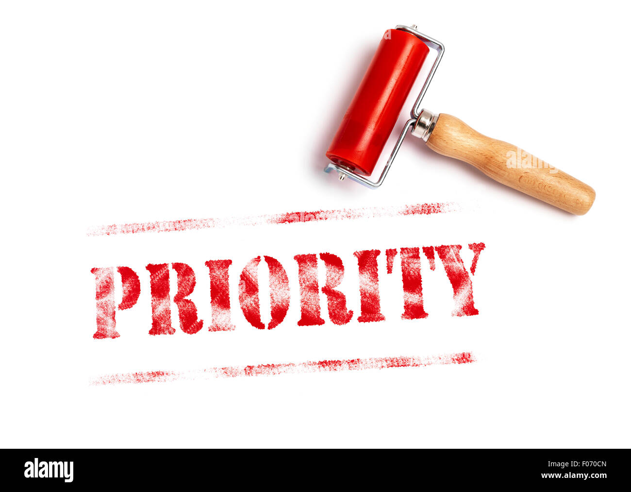 Priority red ink with ink roller Stock Photo