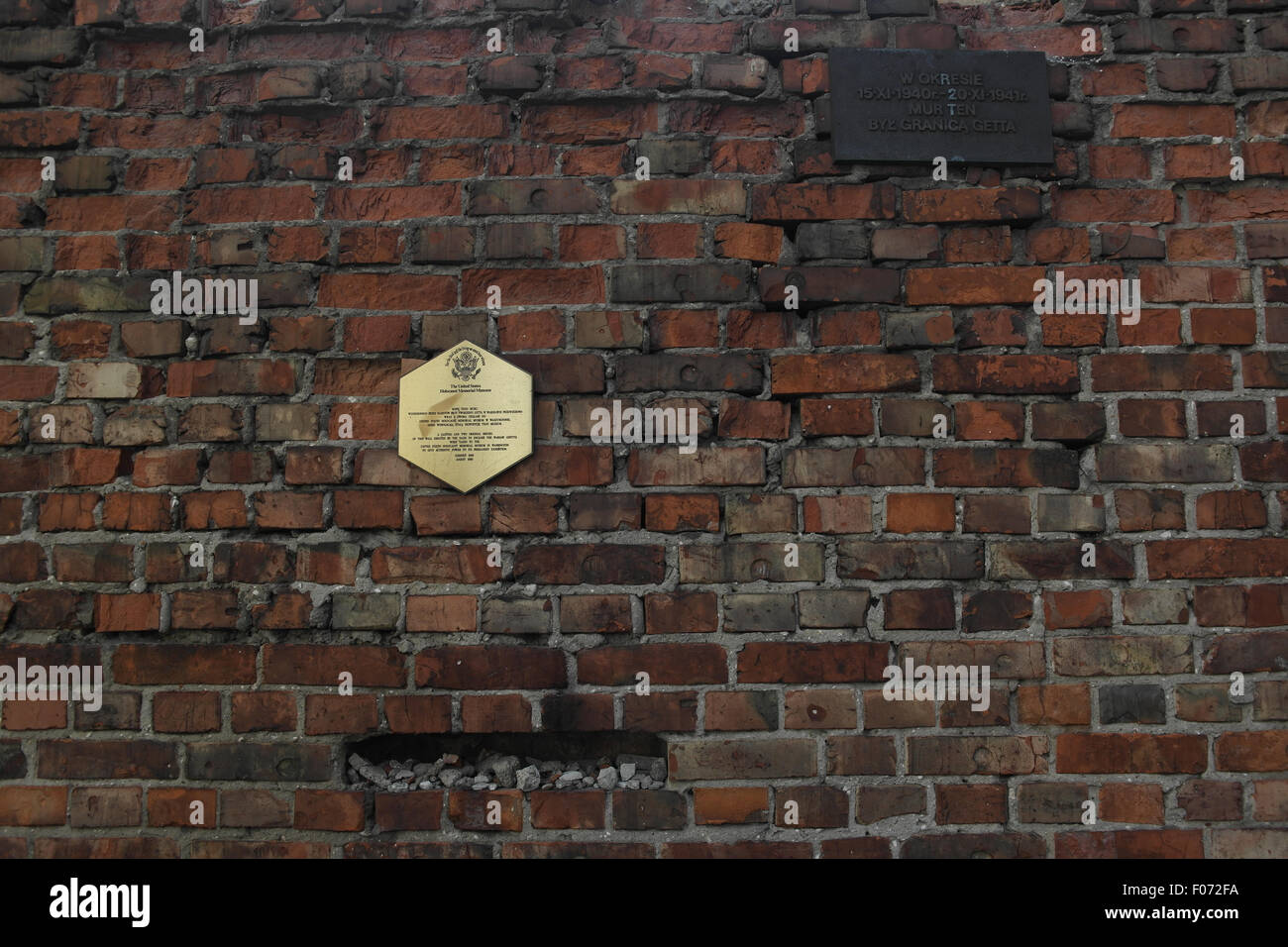 Ghetto wall section, with United States Holocaust Museum plaque and one