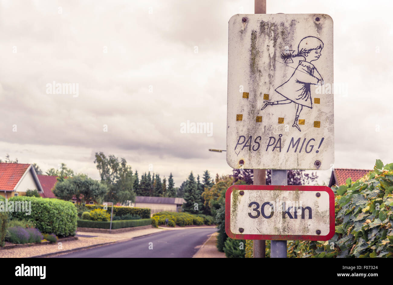 Danish sign with playing kids on a street Stock Photo - Alamy