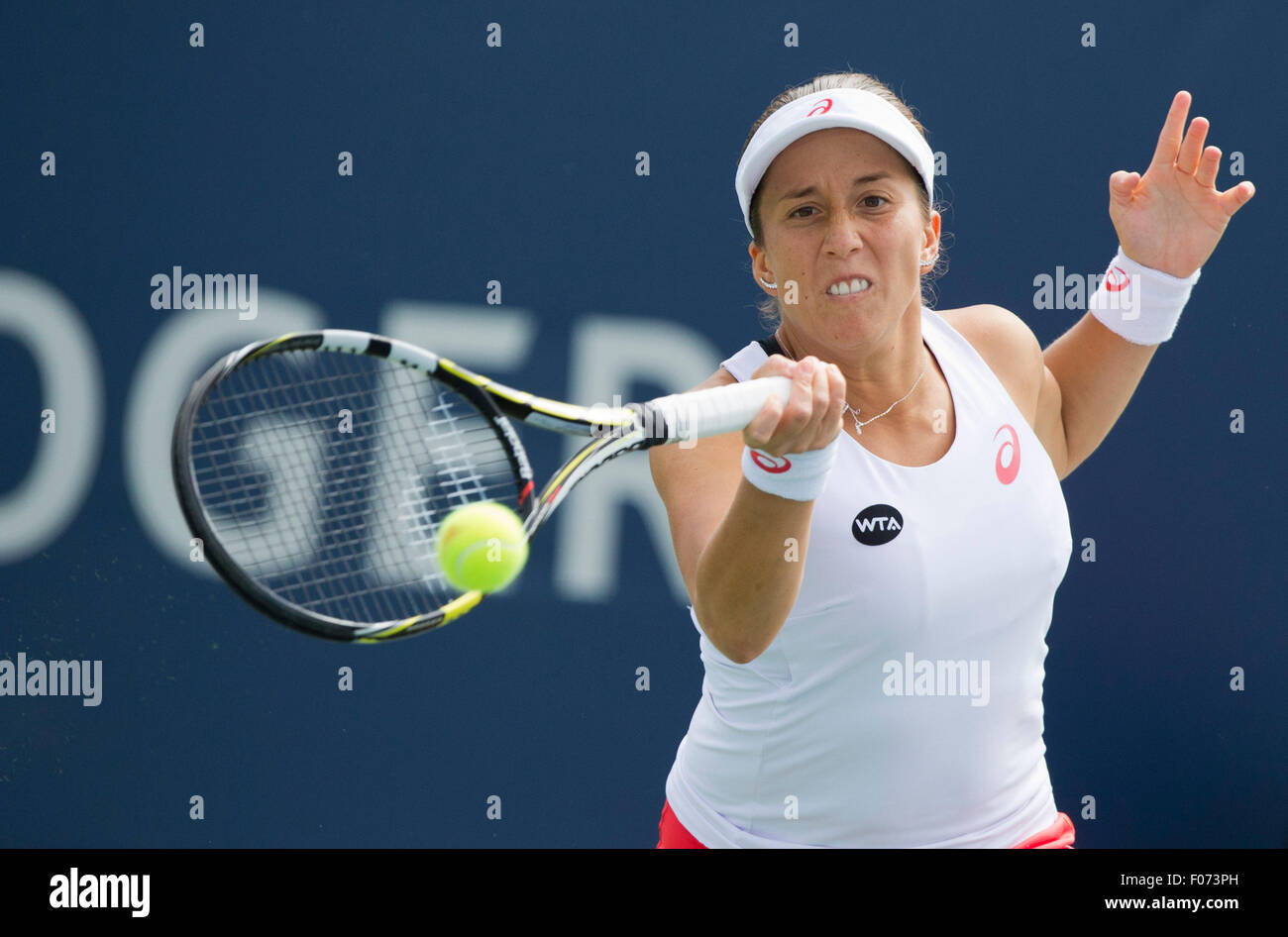 (150809) -- TORONTO, Aug. 9, 2015(Xinhua) -- Irina Falconi of the United States returns the ball against Sharon Fichman of Canada during the first round of women's singles qualifying match at the 2015 Rogers Cup in Toronto, Canada, Aug. 8, 2015. Irina Falconi won 2-0. (Xinhua/Zou Zheng) Stock Photo