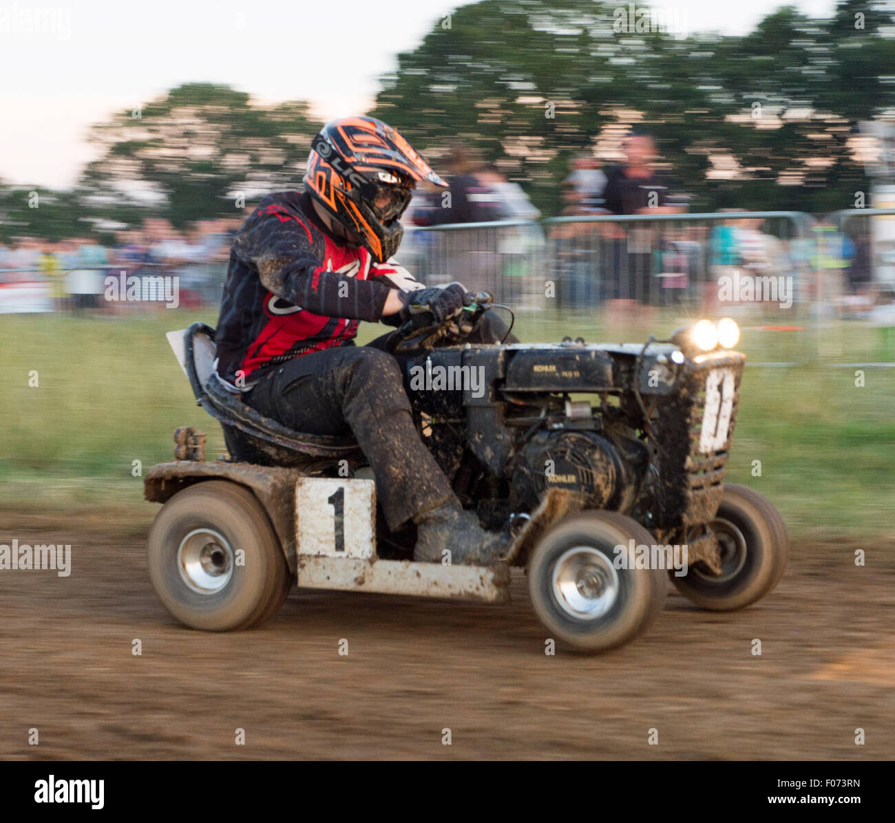 Billingshurst, UK. 8th August, 2015. .  Team NORTHERNERS KICK grASS #1 [Daz Whitehead, Andy Rostron, Mark Rostron] in action.  The BLMRA 12 Hour Lawn Mower Race. Credit:  Stephen Bartholomew/Alamy Live News Stock Photo