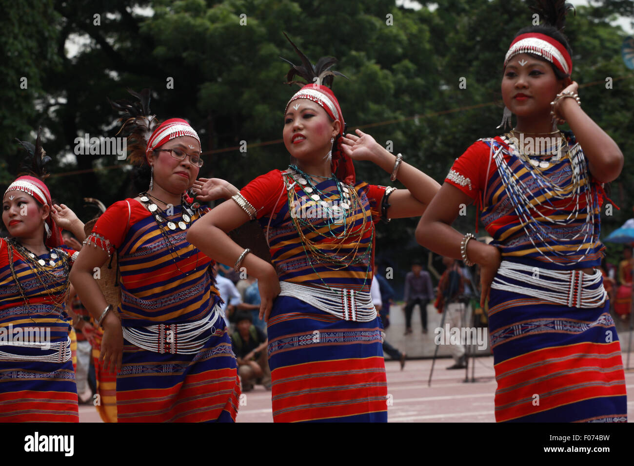 Dhaka, Bangladesh. 9th August, 2015. Bangladeshi indegenious women participate in a gathering in Dhaka held to celebrate United Nations' (UN) International Day of the World's Indigenous People. The event is observed to promote and protect the rights of the indigenous communities rich and diverse cultures  in Dhaka on August 8, 2015.  This year United Ntions make slogan for ths day is 'Ensuring indigenous peoples' health and well-being'. Credit:  zakir hossain chowdhury zakir/Alamy Live News Stock Photo