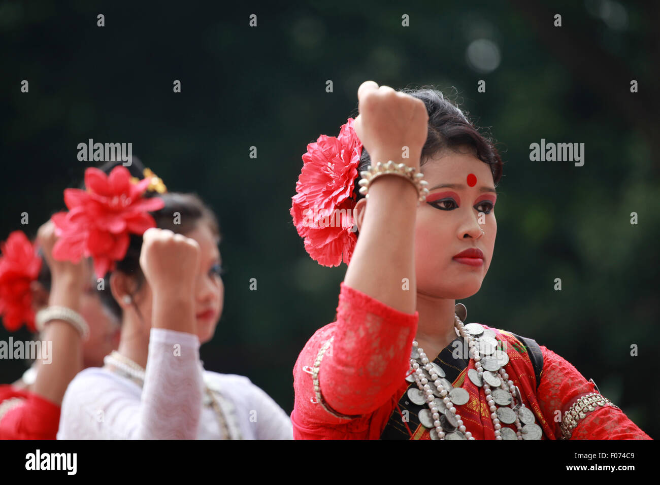 Dhaka, Bangladesh. 9th August, 2015. Bangladeshi indegenious women participate in a gathering in Dhaka held to celebrate United Nations' (UN) International Day of the World's Indigenous People. The event is observed to promote and protect the rights of the indigenous communities rich and diverse cultures  in Dhaka on August 8, 2015.  This year United Ntions make slogan for ths day is 'Ensuring indigenous peoples' health and well-being'. Credit:  zakir hossain chowdhury zakir/Alamy Live News Stock Photo