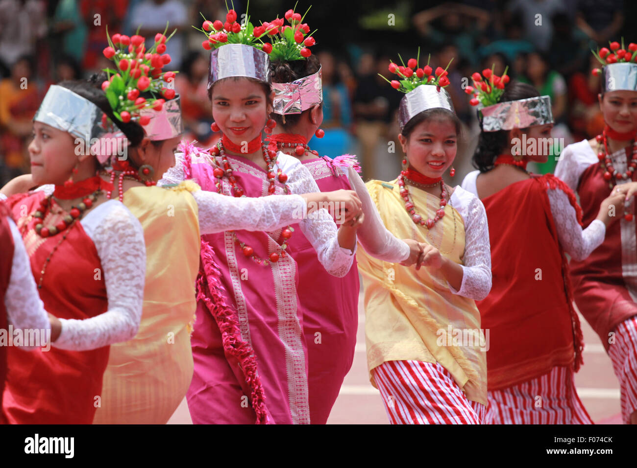 Dhaka, Bangladesh. 9th August, 2015. Bangladeshi indegenious women participate in a gathering in Dhaka held to celebrate United Nations' (UN) International Day of the World's Indigenous People. The event is observed to promote and protect the rights of the indigenous communities rich and diverse cultures  in Dhaka on August 8, 2015.  This year United Ntions make slogan for ths day is 'Ensuring indigenous peoples' health and well-being'. Credit:  zakir hossain chowdhury zakir/Alamy Live News Stock Photo