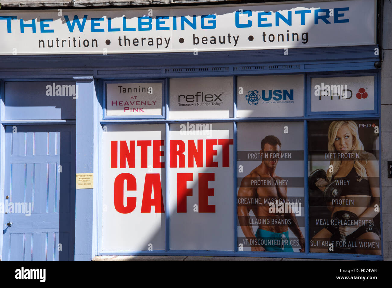 The Wellbeing Centre health, beauty, therapy shop with Internet Cafe on high street Wolverhampton  West Midlands, uk Stock Photo