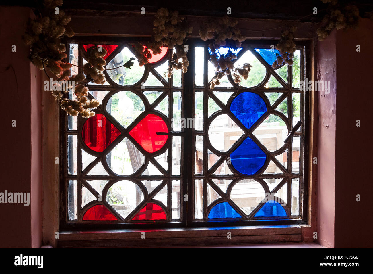 Ancient window in 'The Royal Standard of England' pub, Forty Green, Beaconsfield, Buckinghamshire, England, United Kingdom Stock Photo