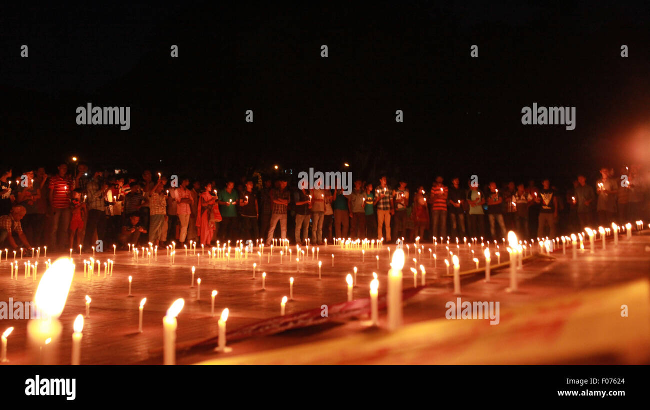 Dhaka, Bangladesh. 8th August, 2015. Indigenous People of Bangladesh celebrate the International Day of the World's Indigenous People 2015 by Lighting thousand candles at the Central Shahid Minar  in Dhaka on August 8, 2015.  This year United Ntions make slogan for ths day is "Ensuring indigenous peoples' health and well-being". Credit:  zakir hossain chowdhury zakir/Alamy Live News Stock Photo
