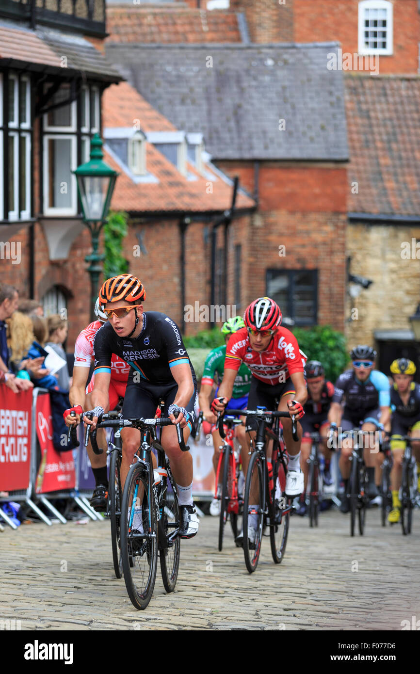 The peloton crest the cobbled climb of Michaelgate and Wordsworth Street during the British National Championships 2015, Lincoln Stock Photo