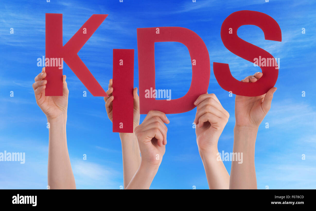 Many People Hands Holding Red Word Kids Blue Sky Stock Photo - Alamy