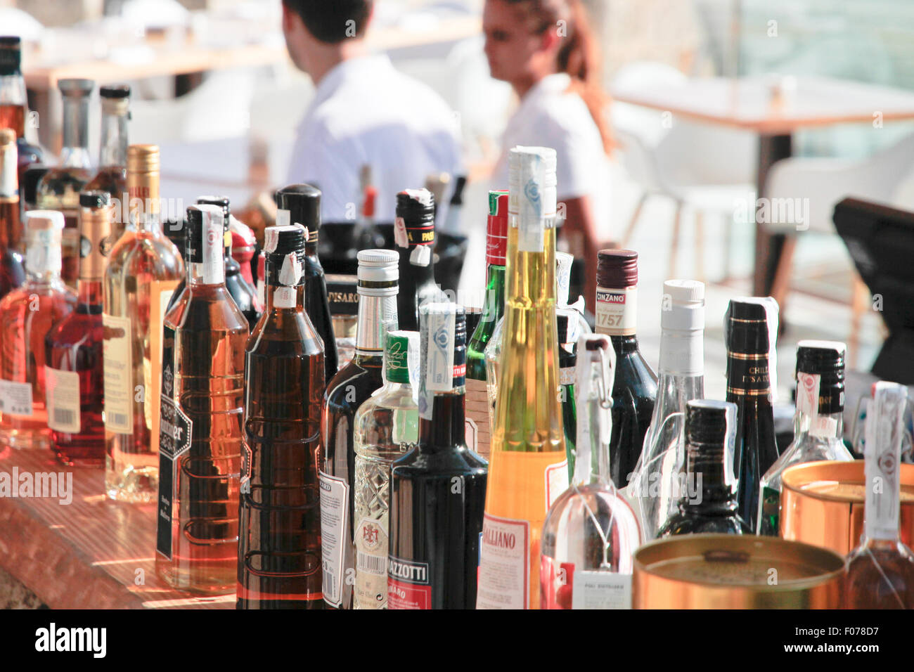 Alcohol liqueurs bottles on bar Stock Photo
