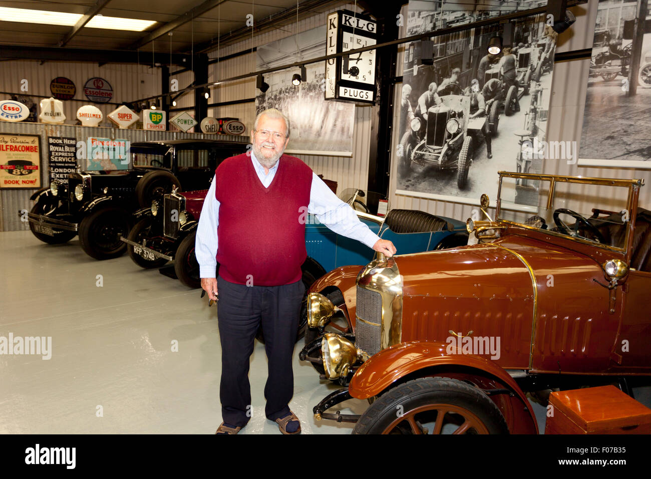 John Haynes founder of the Haynes International Motor Museum, Sparkford, Somerset, England and selection of vintage Morris cars. Stock Photo