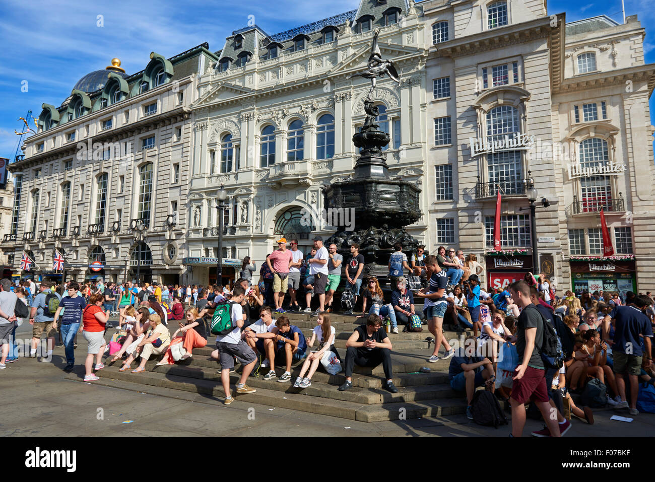 People around the Statue of Eros in Piccadilly Circus, London, United Kingdom, Europe Stock Photo