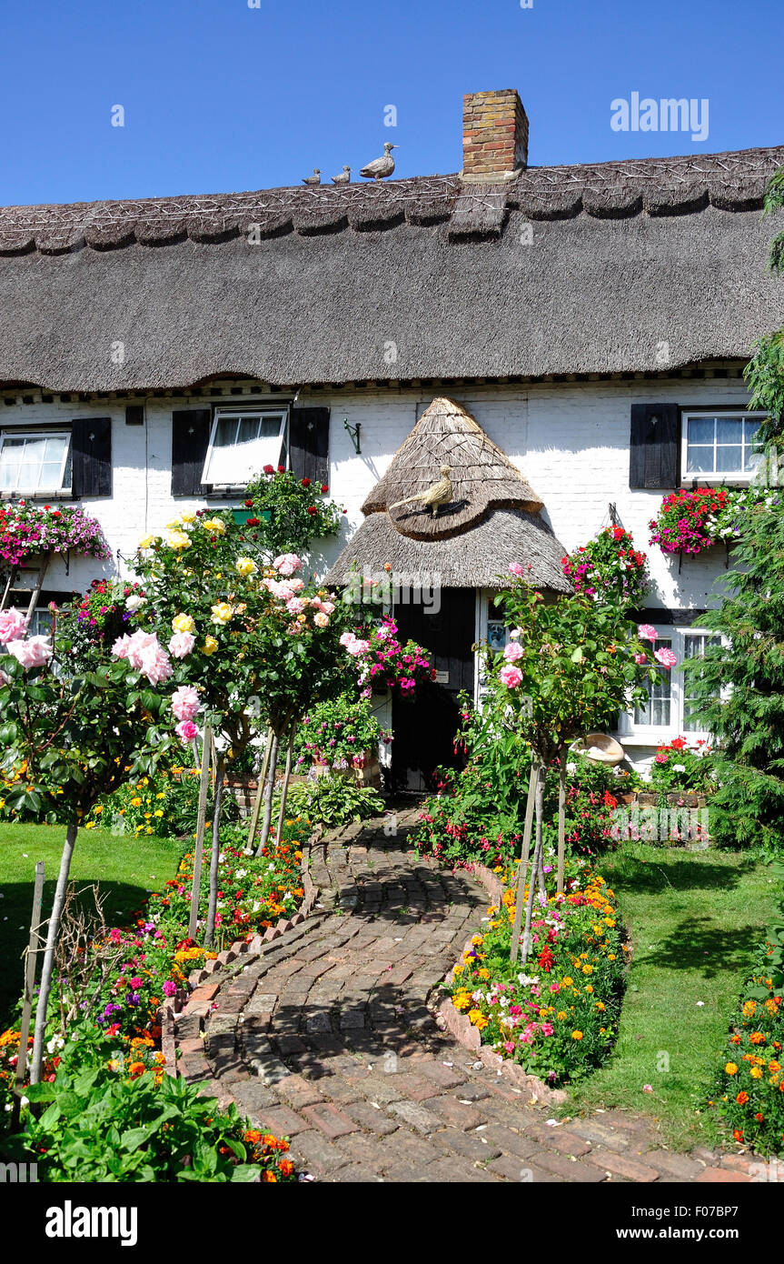 Pretty thatched cottage and garden, Longford Village, London Borough of