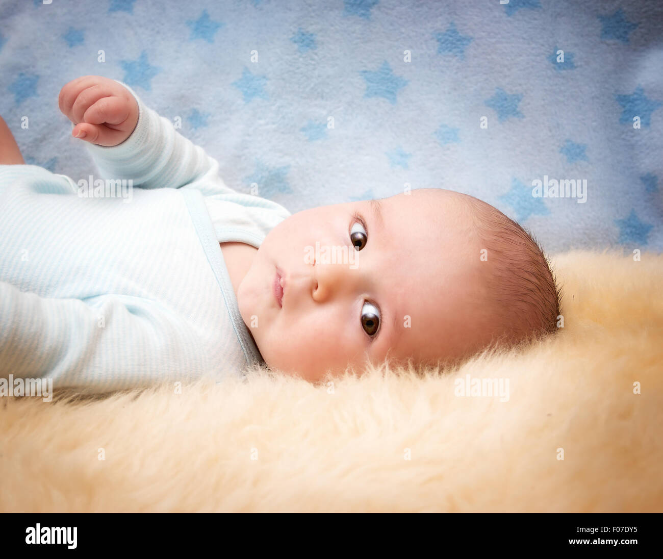 Baby on lamb wool Stock Photo Alamy
