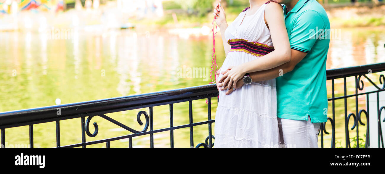 pregnant woman and her husband in the park Stock Photo - Alamy