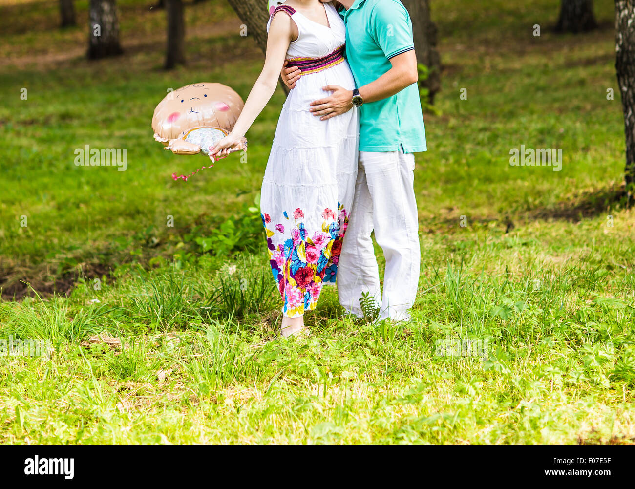 pregnant woman and her husband in the park Stock Photo - Alamy