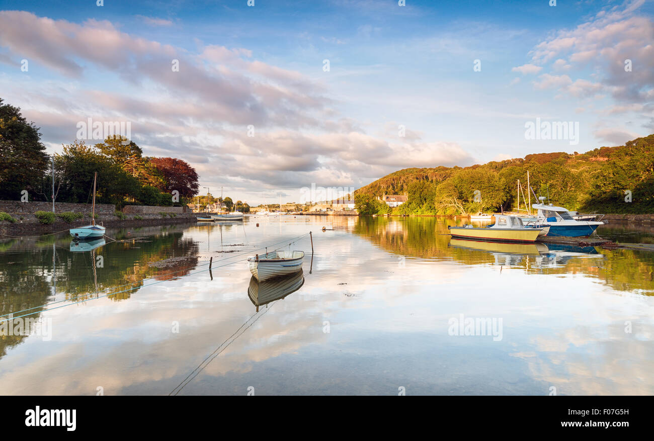Boats at hight tide on the river Tamar at Millbrook in Cornwall Stock Photo