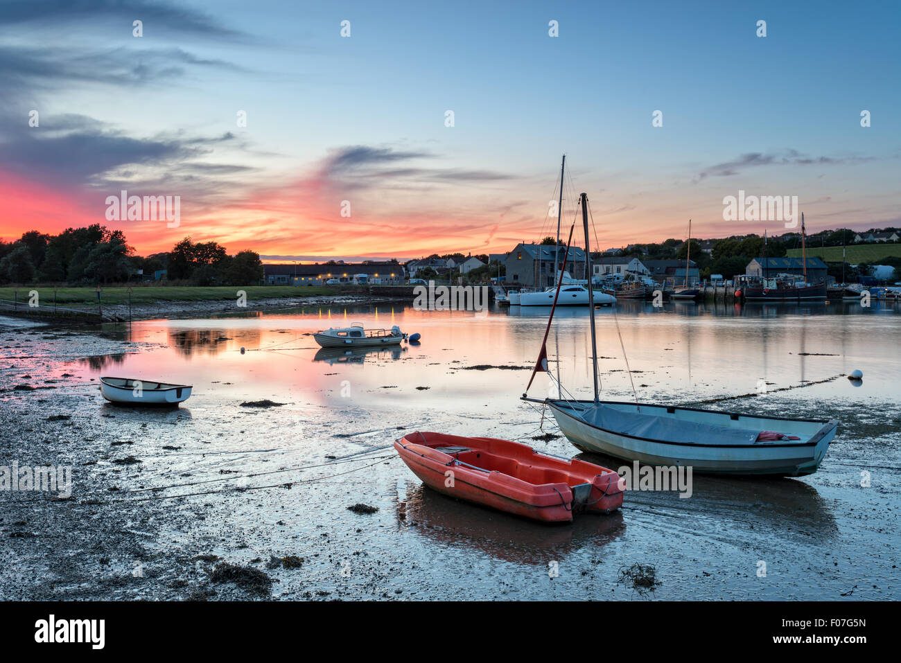 Boats at dusk on the River Tamar at Millbrook in Cornwall Stock Photo