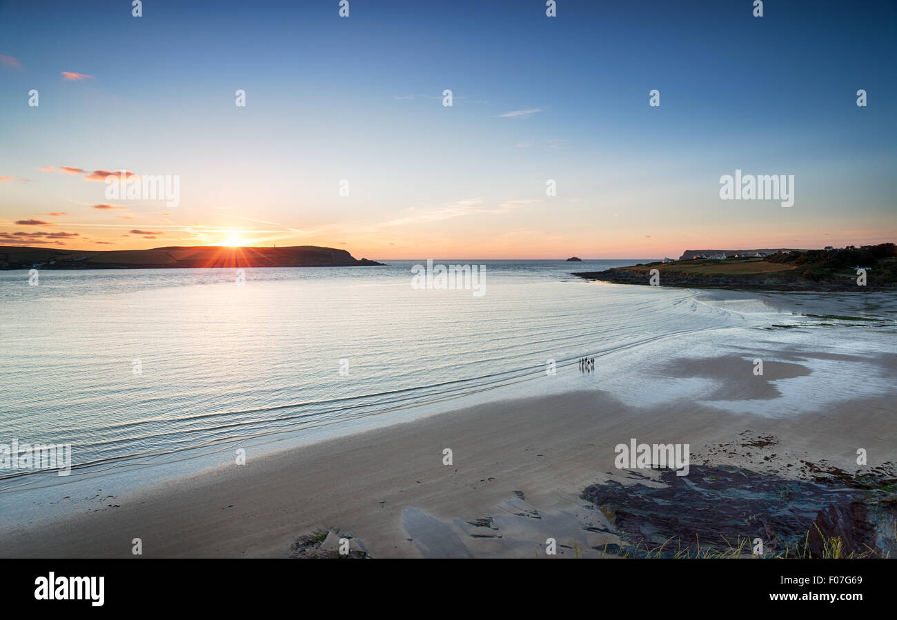 Sunset over the sandy beach at Daymer Bay near Padstow on the north coast of Cornwall Stock Photo
