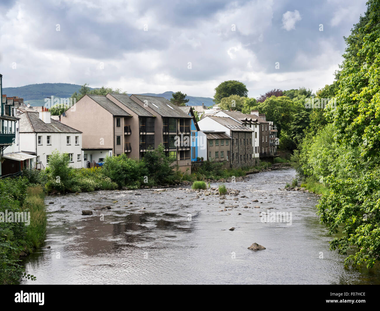 Greta River, Keswick, Cumbria. Renovated buildings are now flats and