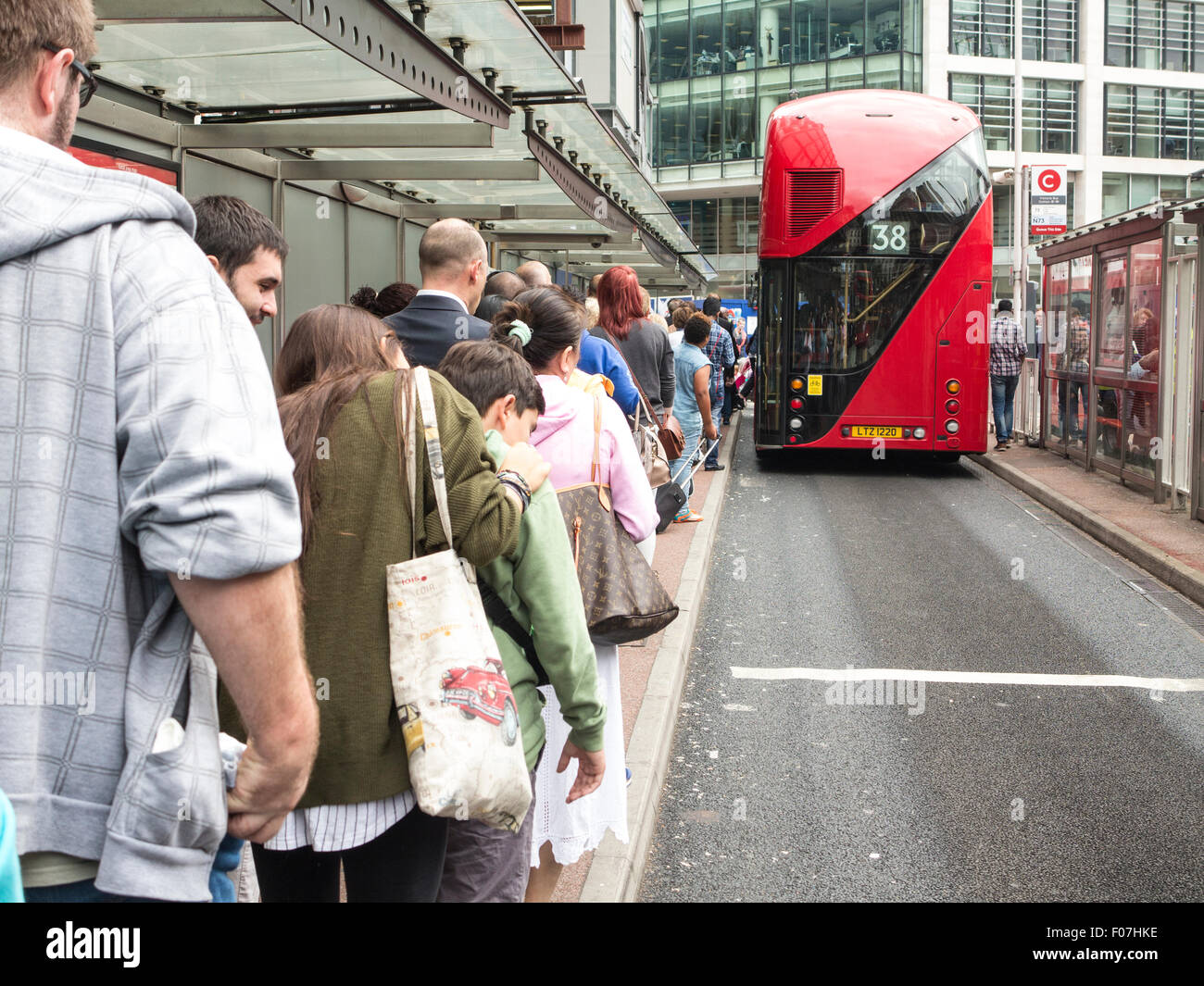 Queues for a bus owing to the London tube underground strikes by the RMT union Stock Photo