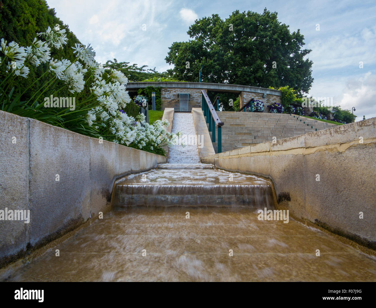 A fountain and waterfall water feature at the All England Tennis Club, Wimbledon, home of the