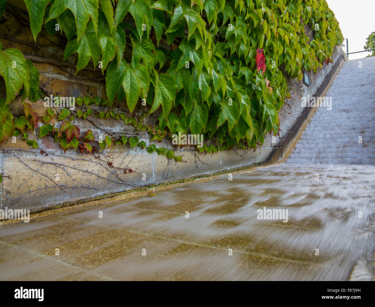 A fountain and waterfall water feature at the All England Tennis Club, Wimbledon, home of the