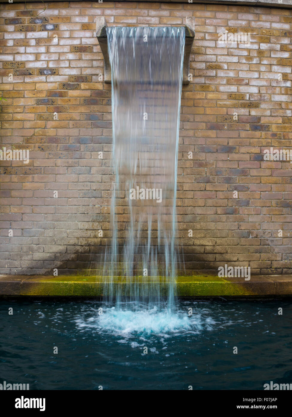 A fountain and waterfall water feature at the All England Tennis Club, Wimbledon, home of the