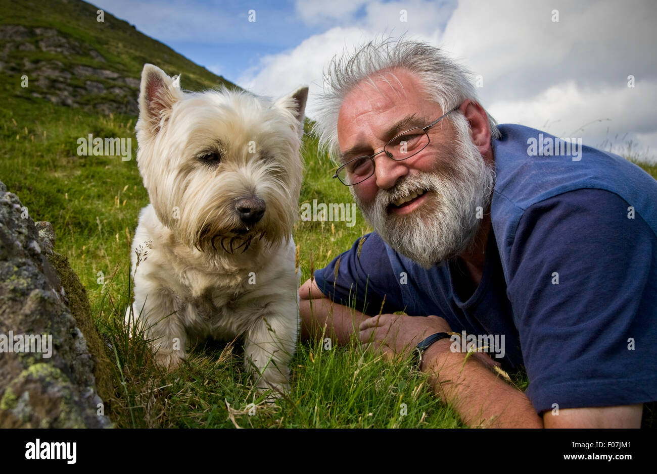 Man with Westy - West Highland Terrier, Comeragh Mountains, County Waterford, Ireland Stock Photo