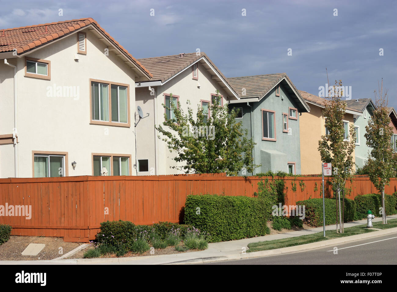Row of new houses in suburban neighborhood Stock Photo