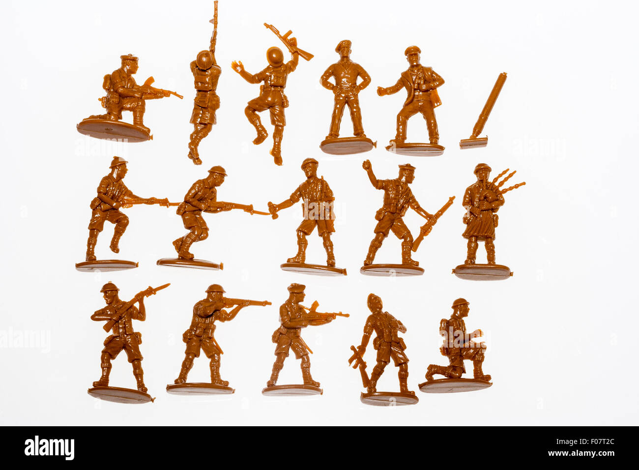 Matchbox, HO/OO, 1/72 scale plastic model figures. World War Two, 8th army. Three rows of soldiers, various positions on plain white background. Stock Photo